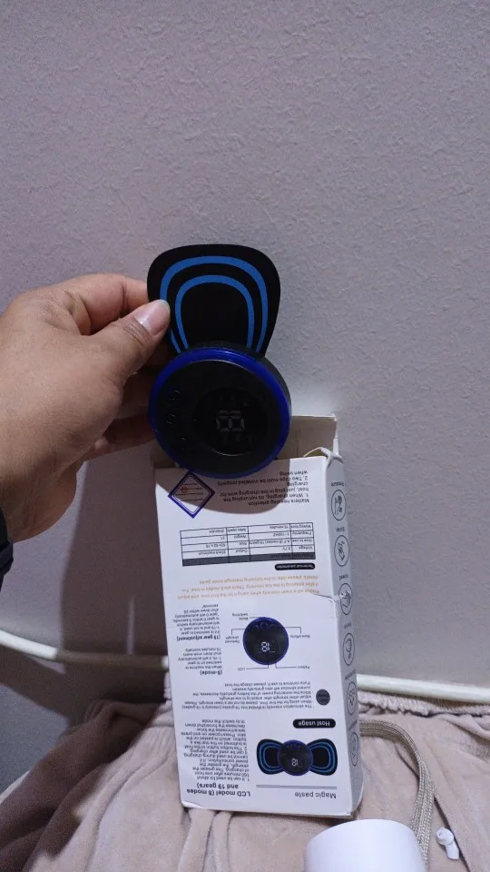 Tragbares EMS Nackenmassagegerät - Muskelstimulator für Nacken- und Rückenschmerzlinderung photo review