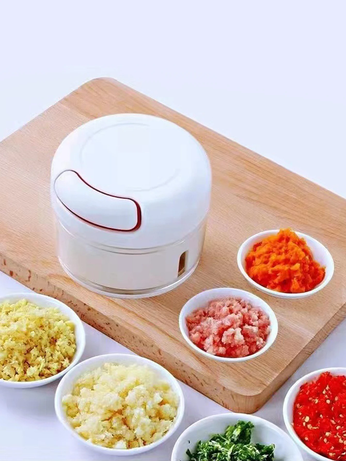 https://ae01.alicdn.com/kf/A4716109f327c44ef9ef9e21348bf50141/Manual-Food-Processor-Vegetable-Chopper-Portable-Hand-Drawn-String-Garlic-Grinder-Onion-Cutter-For-Vegetables-Ginger.jpg