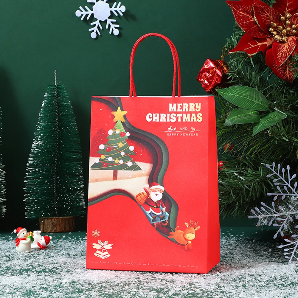thumbnail image 1 of Bolsas de papel kraft para Navidad 2024, bonitas cajas de regalo de Papá Noel para fiestas navideñas, bolsas de embalaje para galletas y dulces para niños con asa, 1 of 5