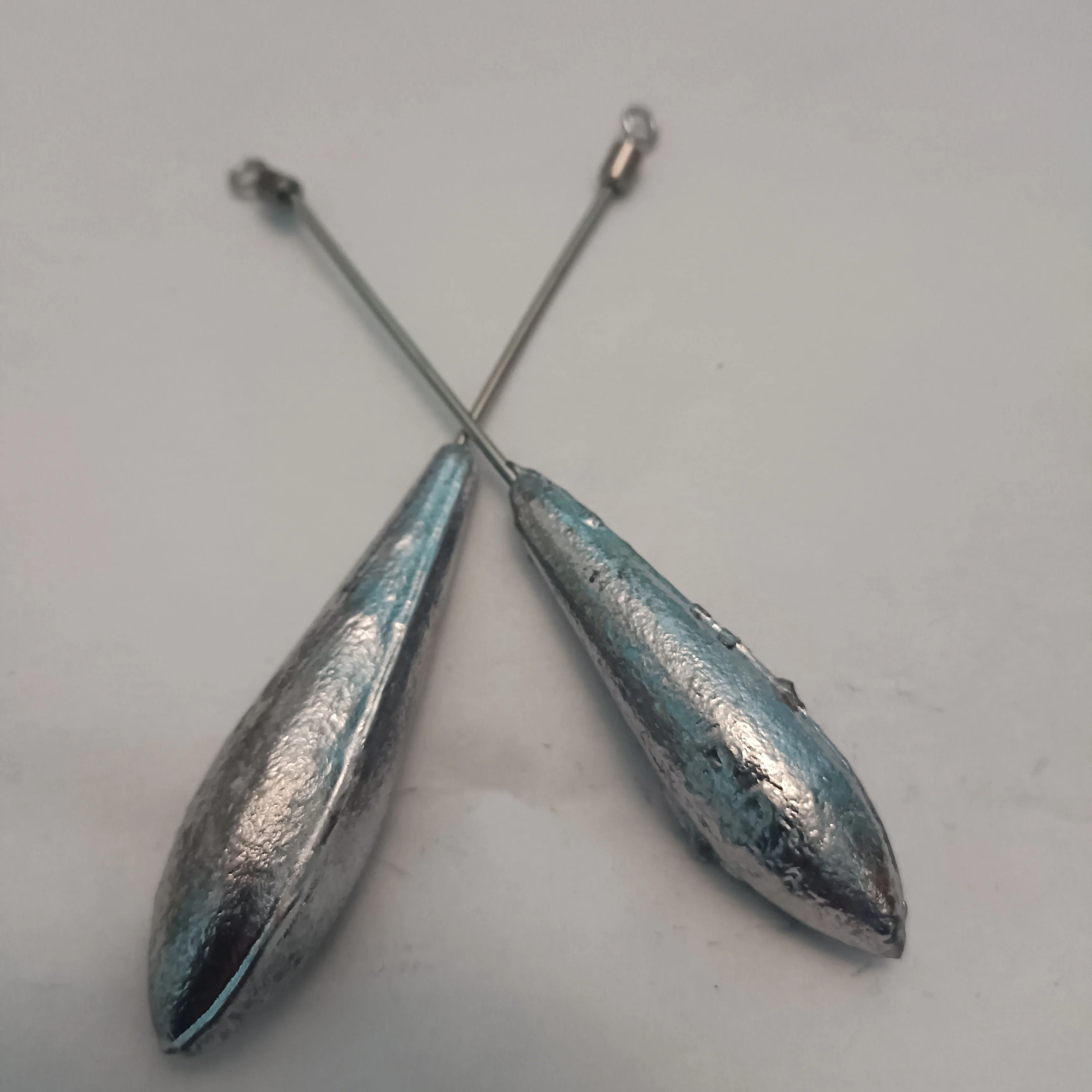 Lot 10 sinkers with Rod and rolling DCA elongated 60gr and 80gr