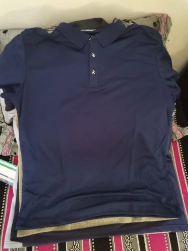 Urban Chic Men's Polo Shirt: Sleek Grey with Classic Striped Trim Detail photo review