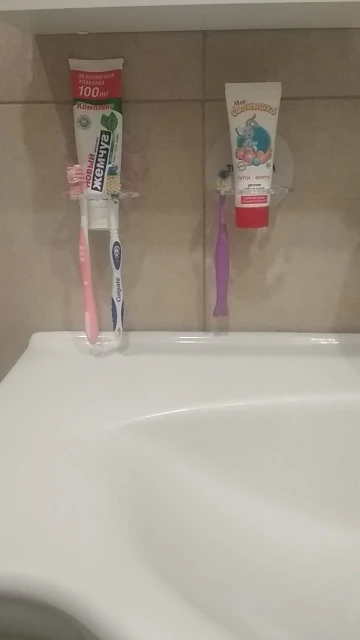 Toothbrush Hanger with Toothpaste Dispenser photo review
