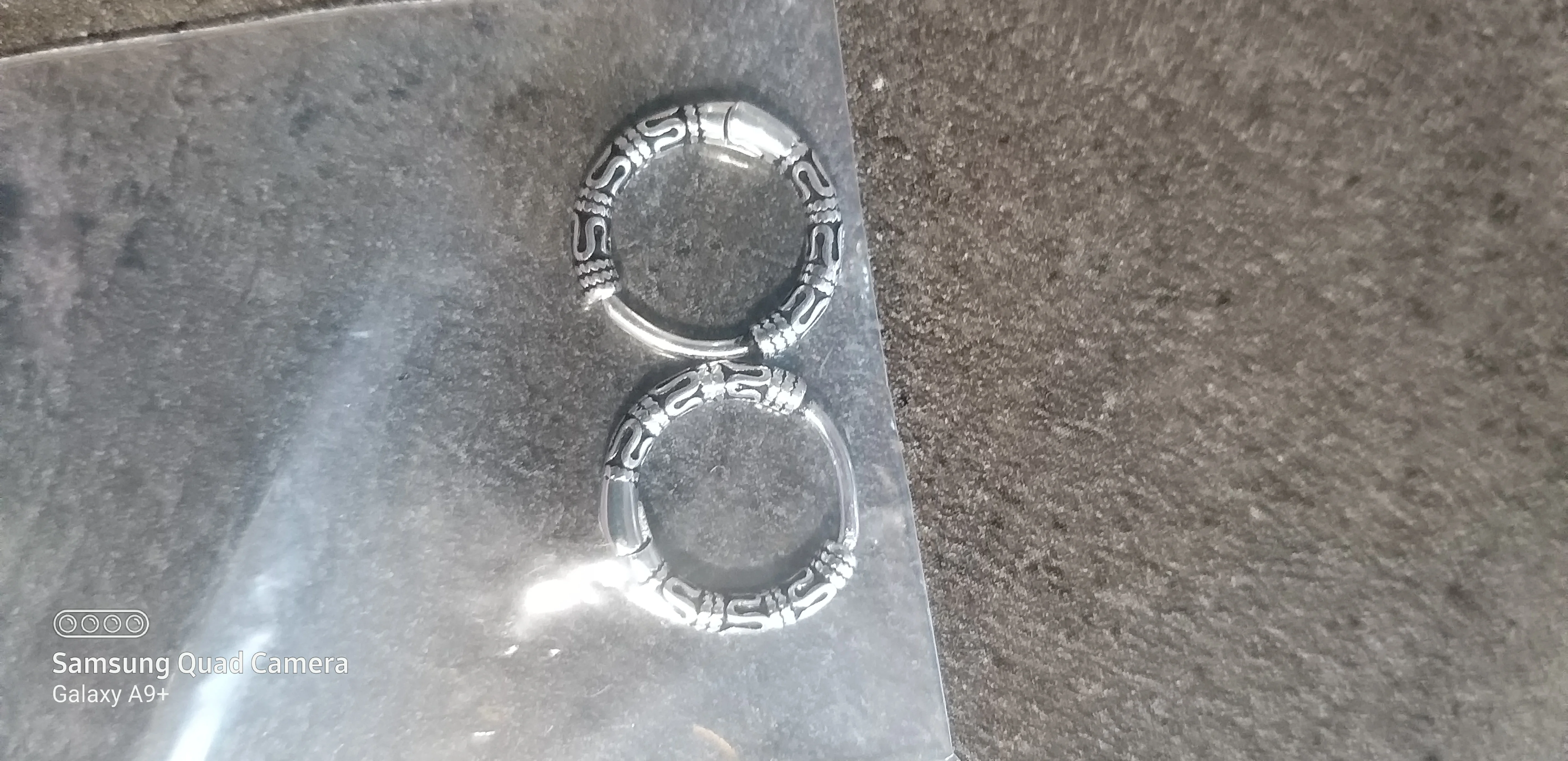 Carved hoops silver