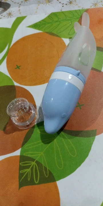 Silicone Dolphin Baby Feeding Bottle - Rice Cereal Spoon and Newborn Tableware photo review