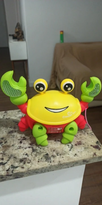 Brinquedo Caranguejo Fujão Musical Som Luz E Movimento photo review