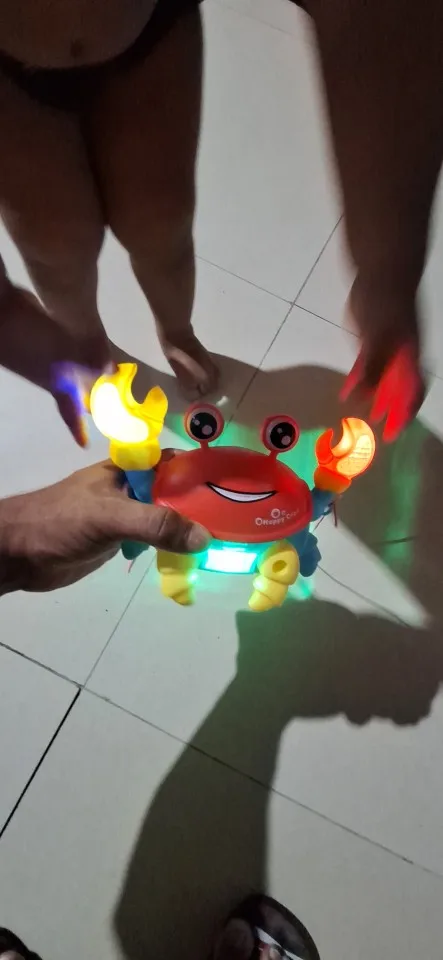 Brinquedo Caranguejo Fujão Musical Som Luz E Movimento photo review