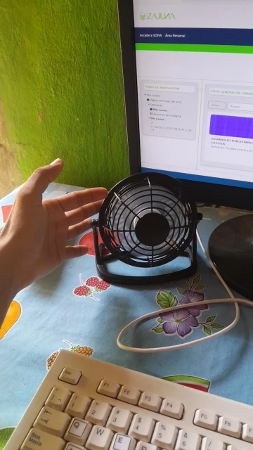 Silent USB Desk Fan 4 Blade Rotatable Mini Cooler photo review