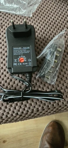 3V 4.5V 5V 6V 7.5V 9V 12V 2A/2.5A AC/DC Adapter US/EU/UK/AU Adjustable Power Adapters USB Universal Charger Switch Power Supply photo review