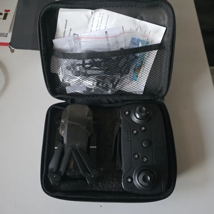 E88 pro RC Drone WIFI FPV with HD 4K Camera Wide Angle View Height Hold Function Foldable Quadcopter Helicopter Toy Gift photo review