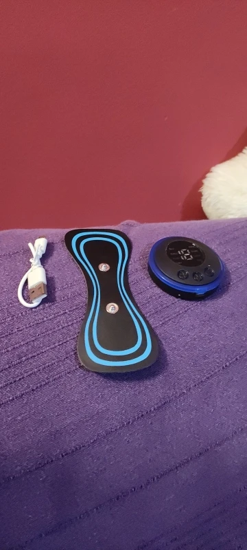 Tragbares EMS Nackenmassagegerät - Muskelstimulator für Nacken- und Rückenschmerzlinderung photo review