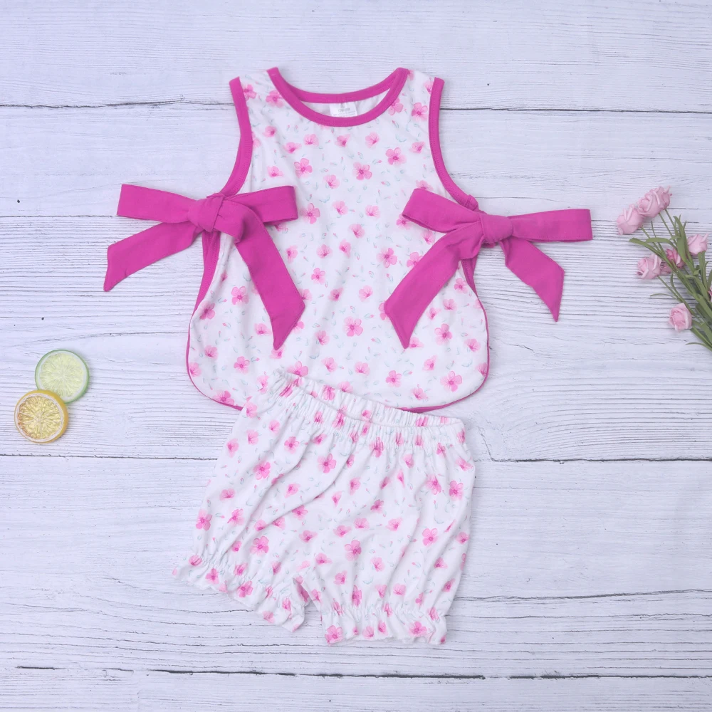 

2023 New Sleeveless Baby Girls Pink Small Flower Print Pattern Round Neck Pink White Stitching Cute Bowknot Girls Clothes