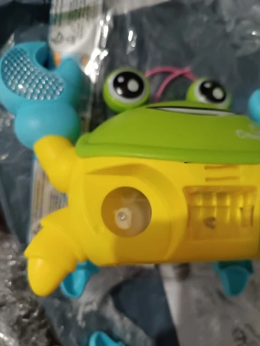 Brinquedo Caranguejo Fujão Musical Som Luz E Movimento photo review