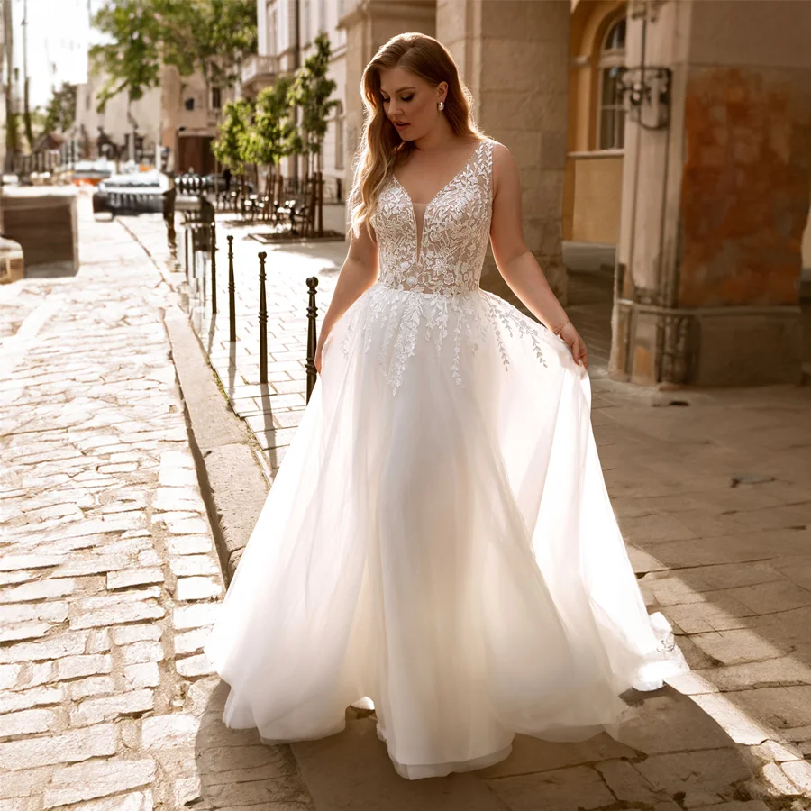 

Dramatic Applique Wedding Dress with Deep V-neckline And Sweep Train Gorgeous Sequin Tulle Bridal Gown with Illusion Back