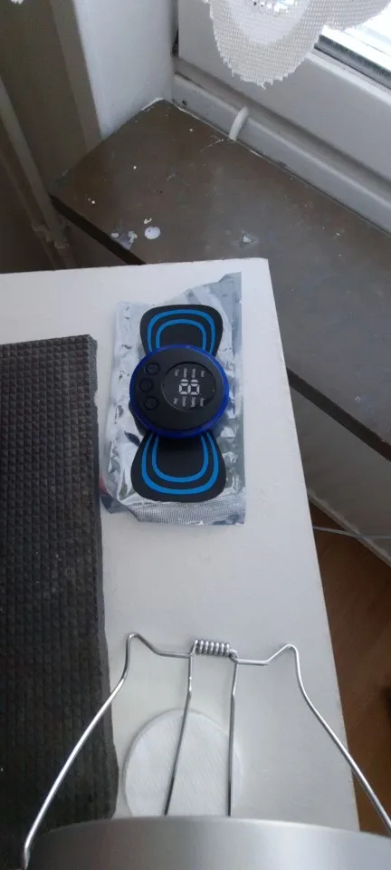 Tragbares EMS Nackenmassagegerät - Muskelstimulator für Nacken- und Rückenschmerzlinderung photo review