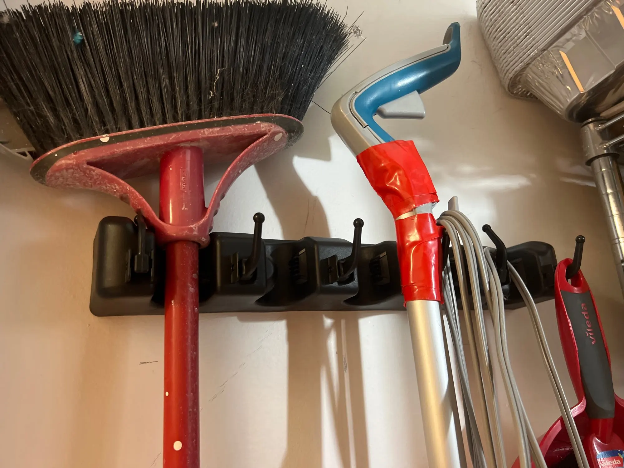 Clean and Tidy: Wall-Mounted Mop Holder with Multi-Functional Broom Hanger – Your Home's Organization Magic photo review