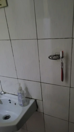 Toothbrush Hanger with Toothpaste Dispenser photo review