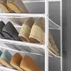 White over-the-door shoe organizer. Holds 36 pairs, metal and mesh design. Space-saving and durable. 4