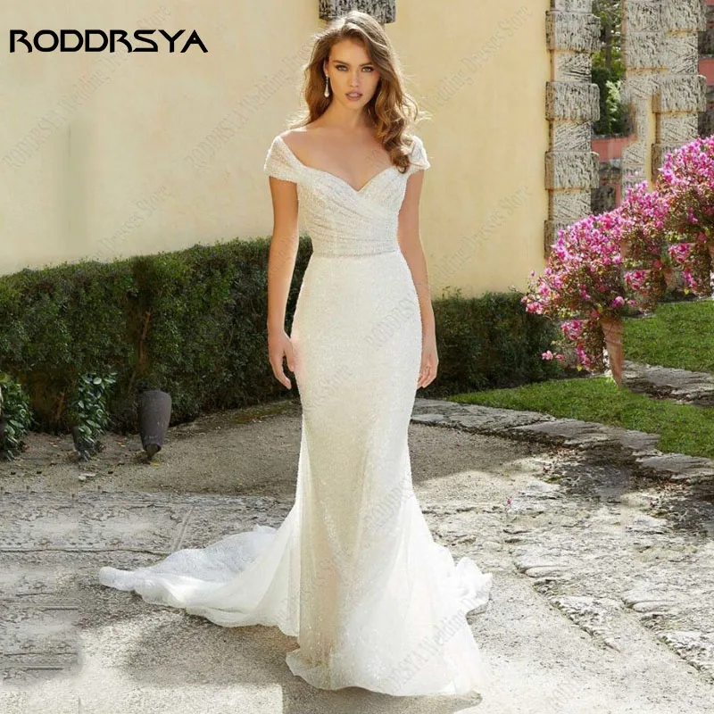 

RODDRSYA Sparkling Pearls Beaded Tulle Wedding Dresses Mermaid Gorgeous Bridal Party Gowns Cap Sleeves V-Neck Vestido Noiva Boho
