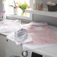 3-piece sanitized mesh wash bag set. Protects delicates during laundry. Durable and functional for gentle cleaning. 1