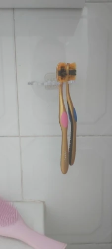 Toothbrush Hanger with Toothpaste Dispenser photo review