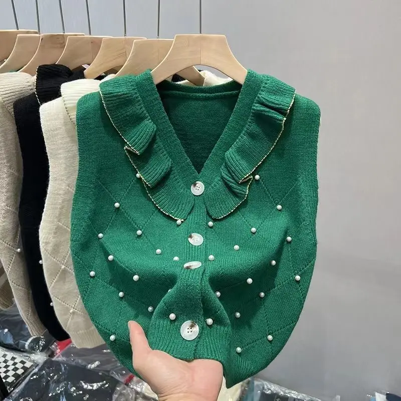 

Женский трикотажный кардиган в клетку, с жемчужинами