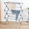 Collapsible silver drying rack with 50lb capacity. Sturdy steel, foldable for indoor/outdoor use. Space-saving and portable. 1