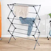 Collapsible silver drying rack with 50lb capacity. Sturdy steel, foldable for indoor/outdoor use. Space-saving and portable. 1