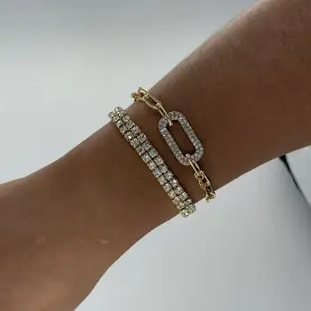 Minimalist two-piece bracelet set comprising a single-strand bracelet and a double-strand zirconia chain bracelet. Birthday gift