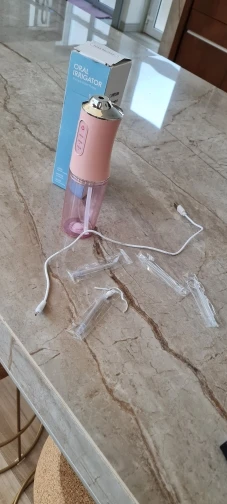 Portable Oral Irrigator | Dental Water Flosser USB Rechargeable photo review
