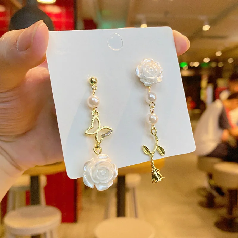 French retro elegant niche gentle asymmetric butterfly white rose earrings Sen series rose flower asymmetric earrings gift