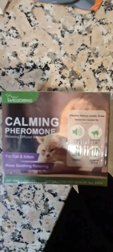 Cat Calming Diffuser Cat Pheromone Plug-In Relaxants Prevent Howling Pet Dogs Anti-Anxiety Reduces Anxiety Cat Calming Liquid photo review