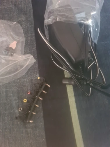 3V 4.5V 5V 6V 7.5V 9V 12V 2A/2.5A AC/DC Adapter US/EU/UK/AU Adjustable Power Adapters USB Universal Charger Switch Power Supply photo review