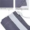 2-pack XL nylon laundry bags with straps. Holds up to 4 loads of clothes. Fits hampers or baskets. Durable grey design. 5