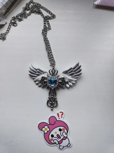 Wing Cross Necklace, customer photo