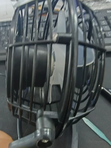 Silent USB Desk Fan 4 Blade Rotatable Mini Cooler photo review