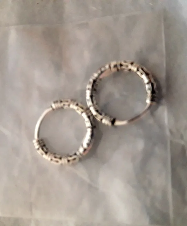 Carved hoops silver