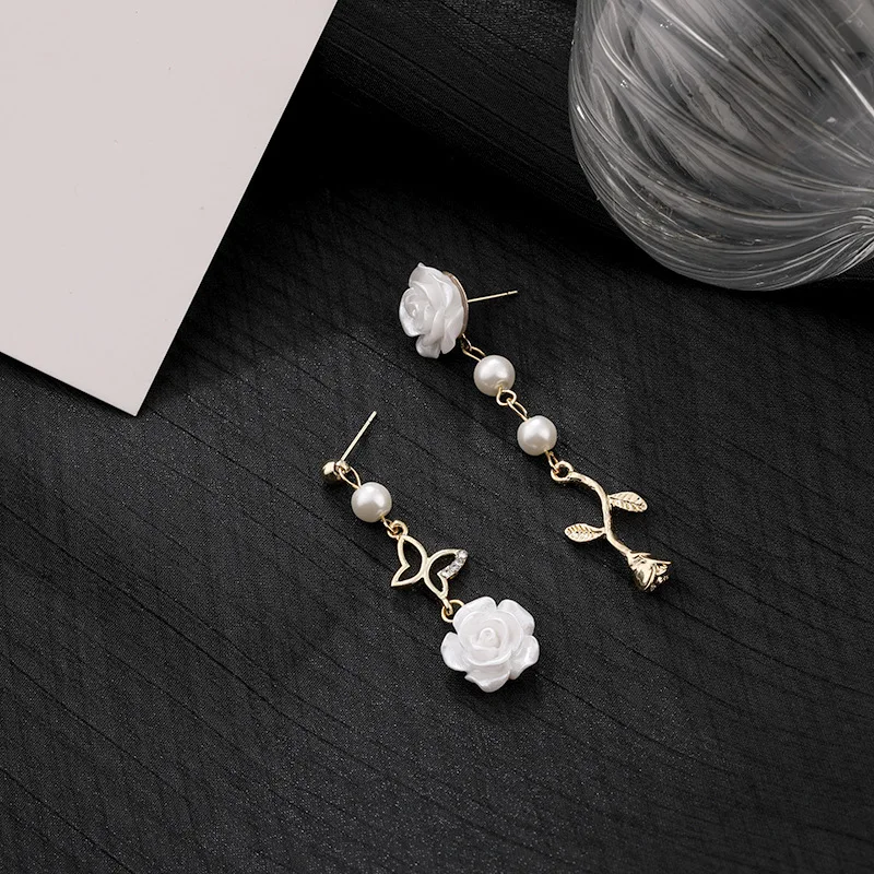 French retro elegant niche gentle asymmetric butterfly white rose earrings Sen series rose flower asymmetric earrings gift