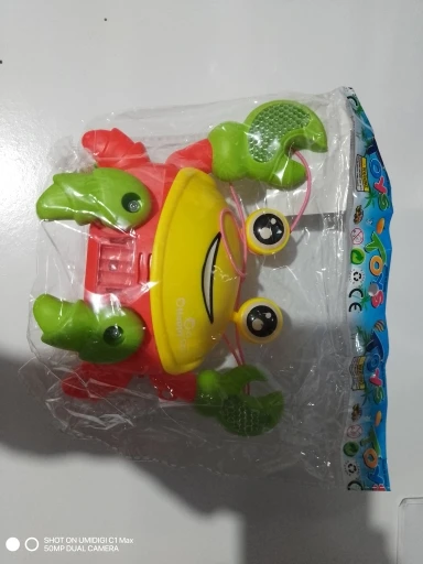 Brinquedo Caranguejo Fujão Musical Som Luz E Movimento photo review