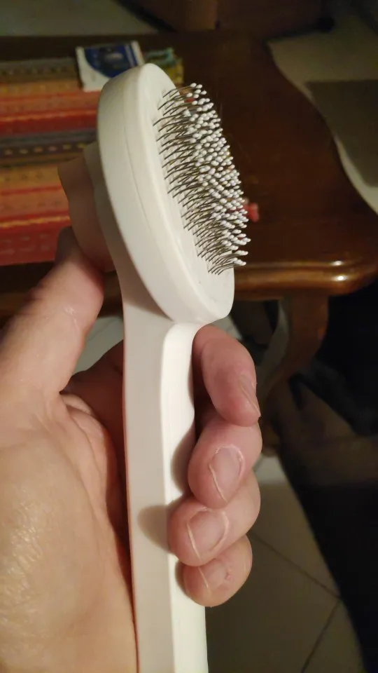 Self-Cleaning Slicker Brush for Dogs and Cats - Removes Tangles, Massages, and Improves Circulation photo review