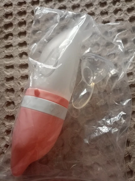 Silicone Dolphin Baby Feeding Bottle - Rice Cereal Spoon and Newborn Tableware photo review