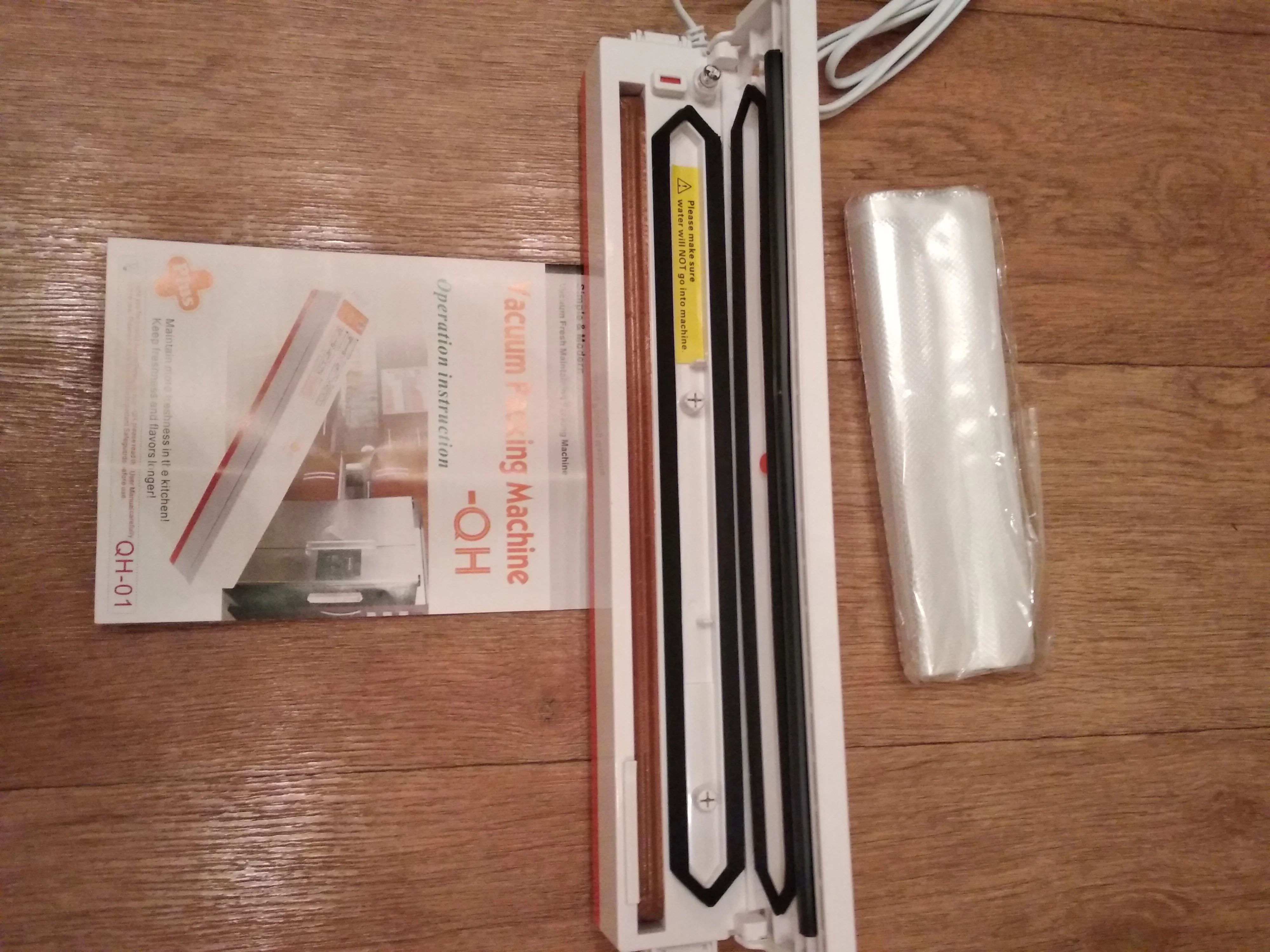 Electric Vacuum Sealer - Keep Your Food Fresh with 15 Saver Bags photo review