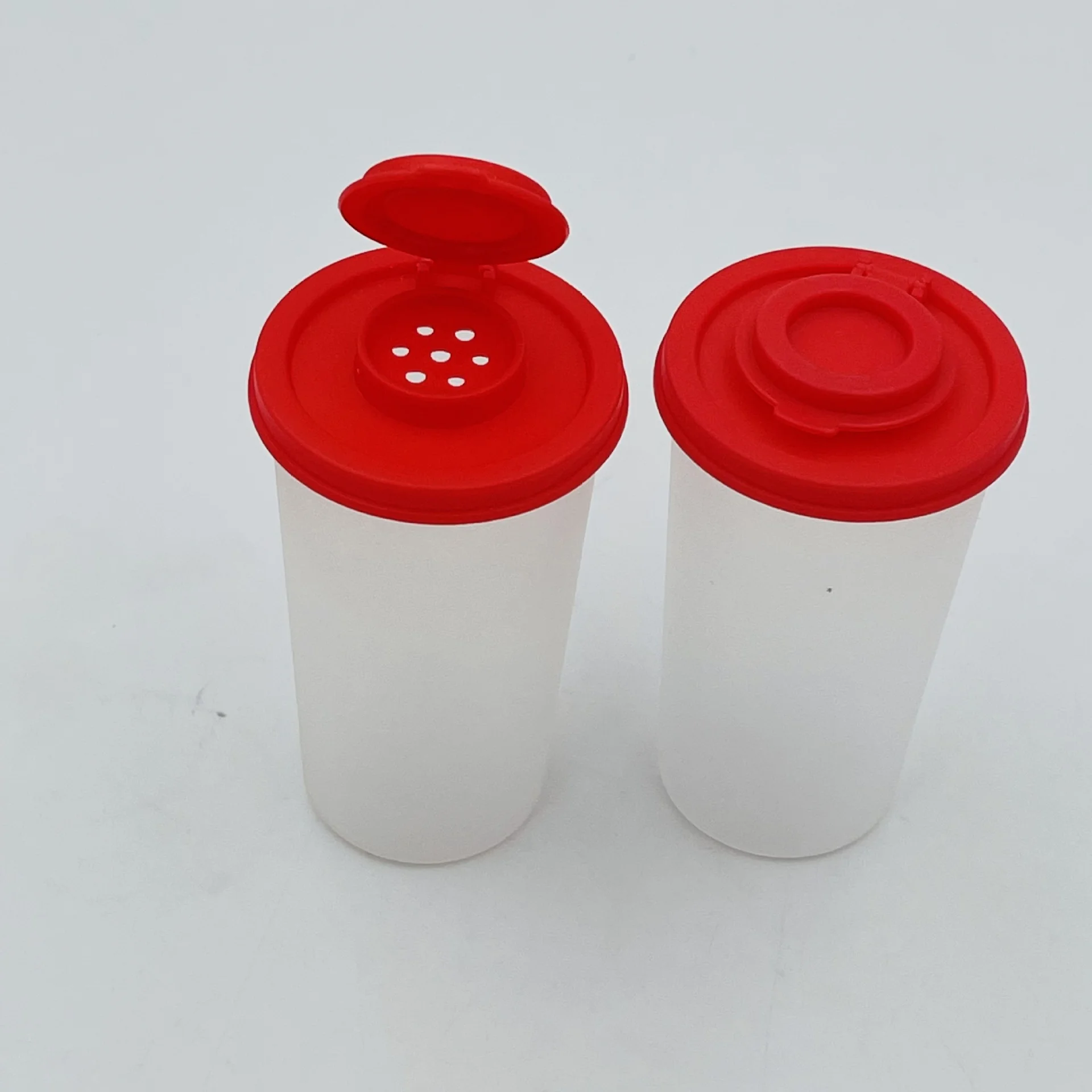 New Tupperware 20 oz.large shaker with red lid