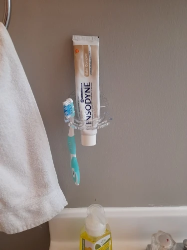 Toothbrush Hanger with Toothpaste Dispenser photo review