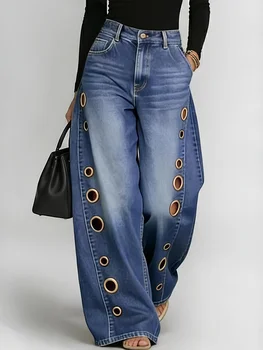 Retro-style wide-leg jeans with metallic eyelets, high-waisted, loose, floor-length fit, gradient eyelets of varying sizes on both sides, distressed washed finish, classic front and back pockets, perfect for everyday casual wear.