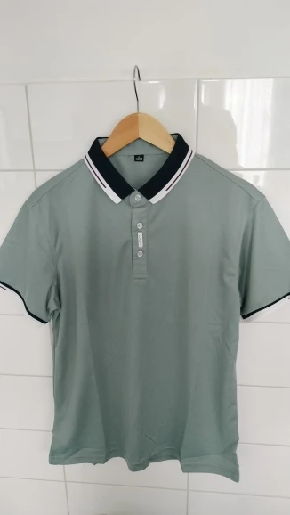 Urban Chic Men's Polo Shirt: Sleek Grey with Classic Striped Trim Detail photo review