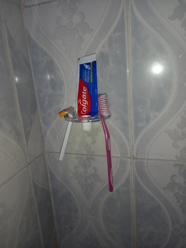 Toothbrush Hanger with Toothpaste Dispenser photo review