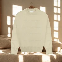 Pull à col rond avec surpiqûres inversées sur tout le vêtement, style unisexe 4