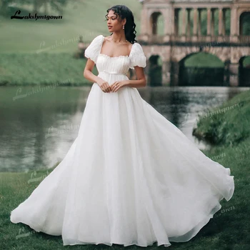 Exquisite Tulle Princess Wedding Dress 2026 Square Bridal Gown Puff Sleeve Bow Wedding Gowns robe de mariée Customized 1