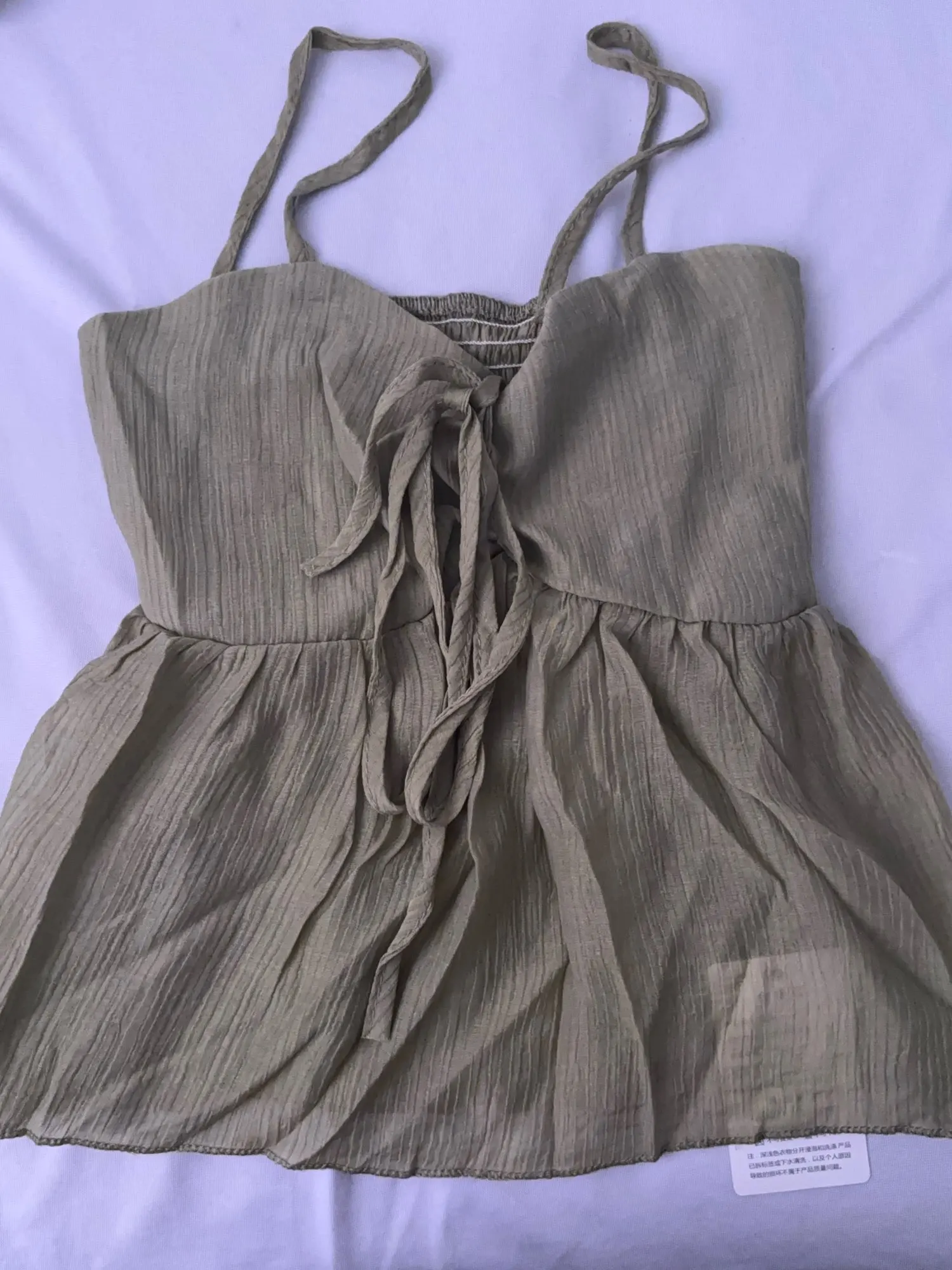 Elegant Linen Blend Babydoll Crop Top with Ruffle Details photo review