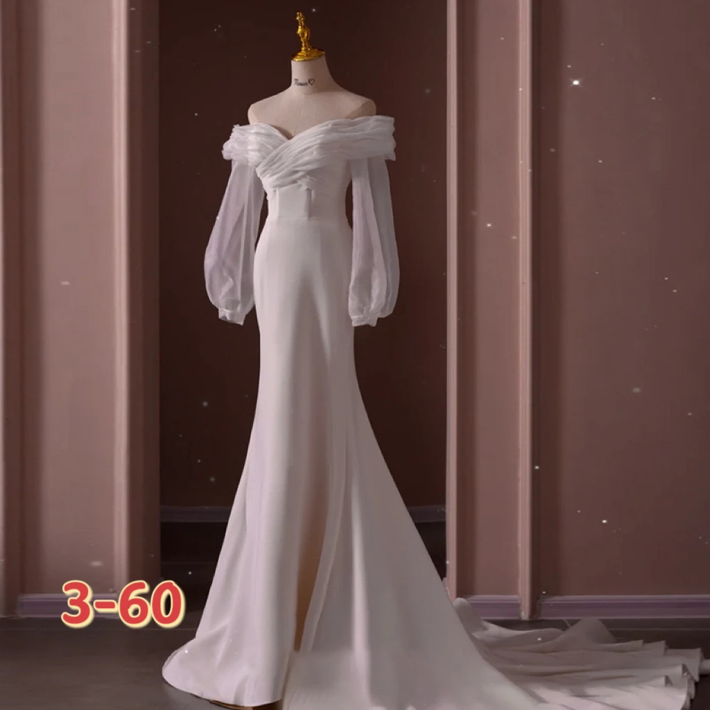 

One shoulder long sleeve light wedding dress